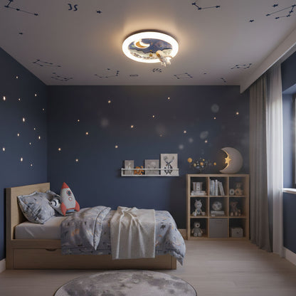 Children's bedroom with starry ceiling and moon-themed decor