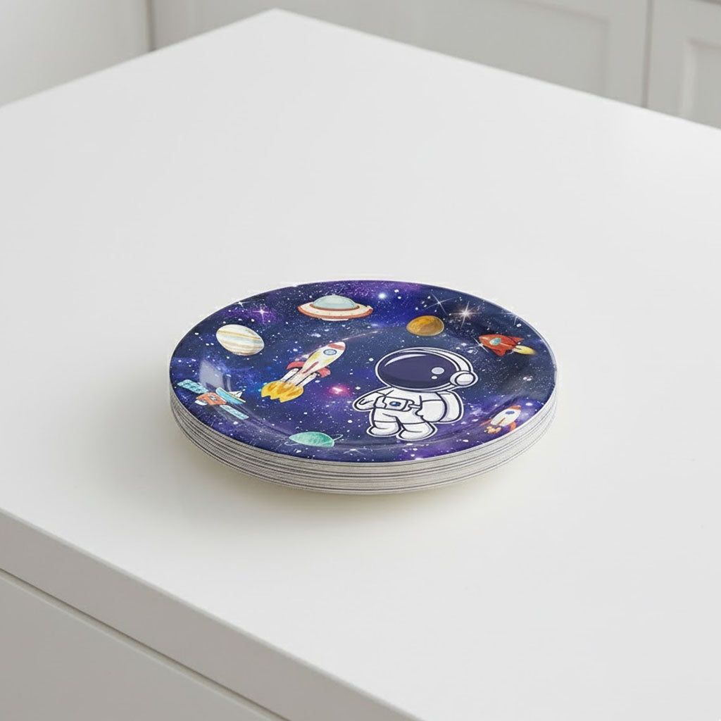 Stack of plates with space-themed design on a white surface