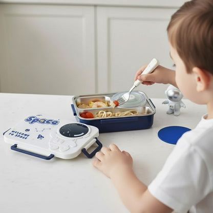 Child eating from a lunchbox with a space-themed container on a white surface